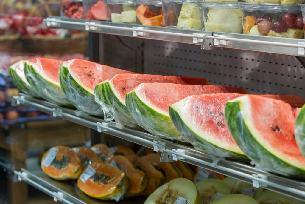 Watermelon, papaya, melon, pineapple grape, fruit on the market shelf