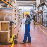 warehouse employees working with pallet boxes