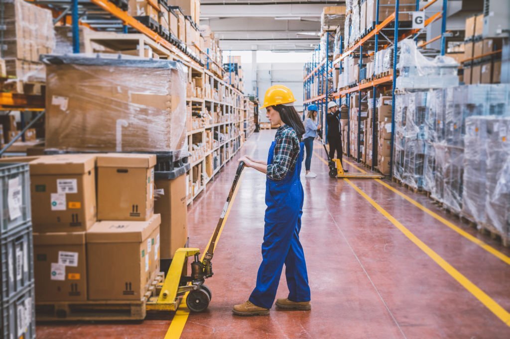 warehouse employees working with pallet boxes